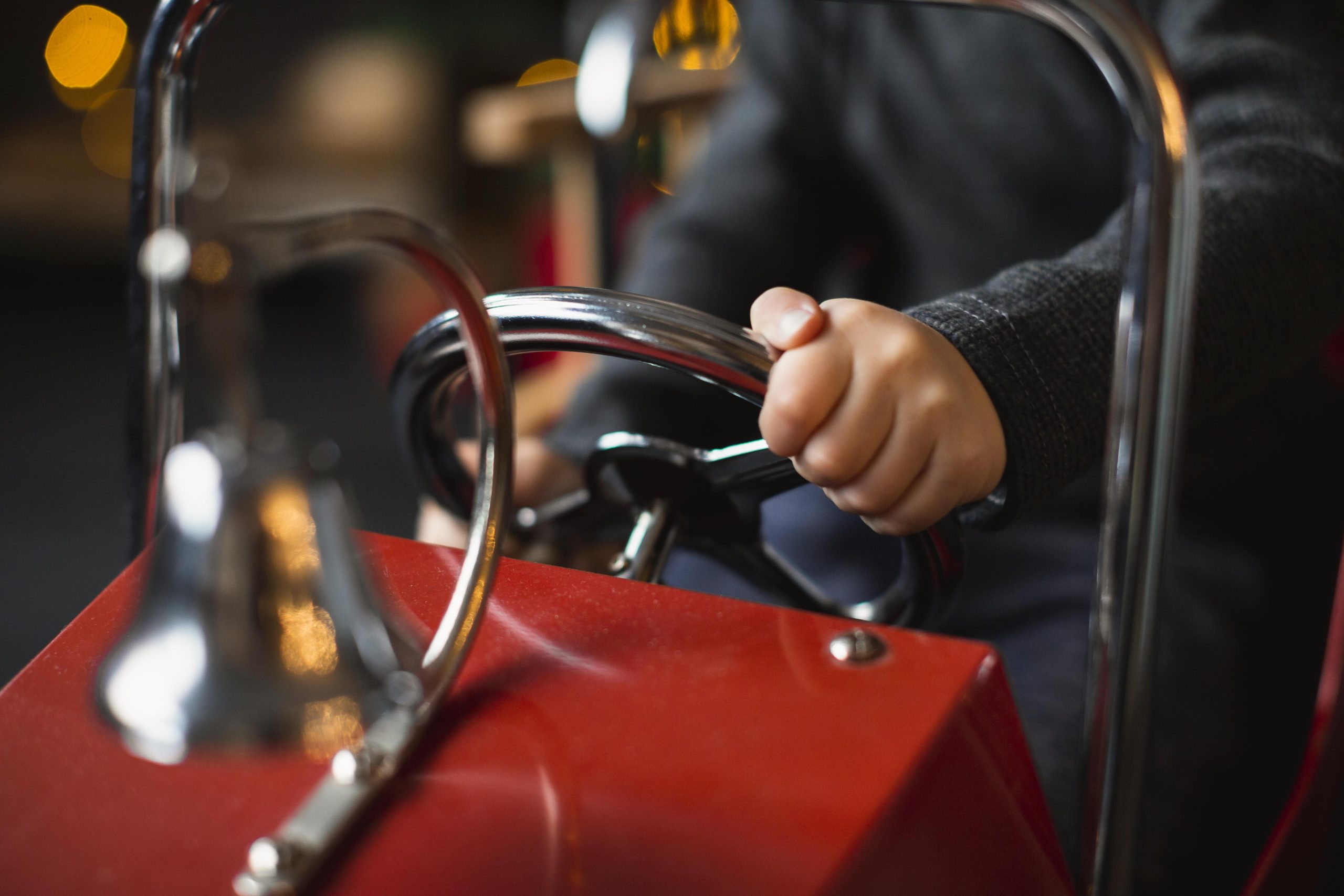 child-playing-with-toy-car